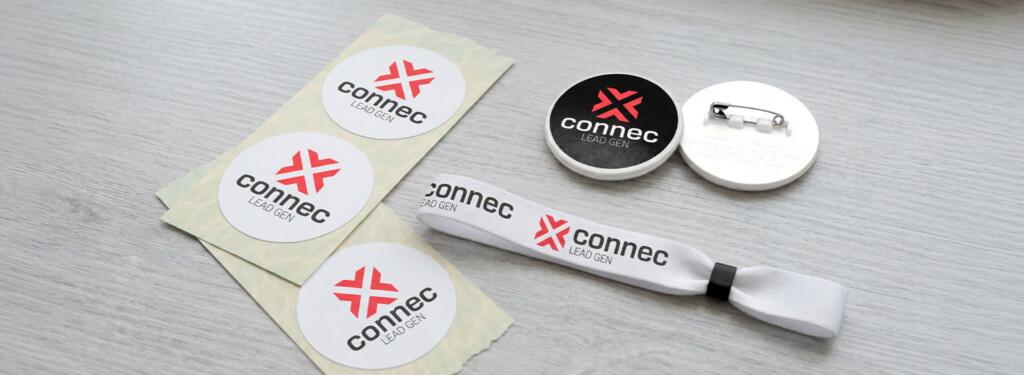 Low-cost-giveaway-printed-badges-wristband-stickers-promotional-products