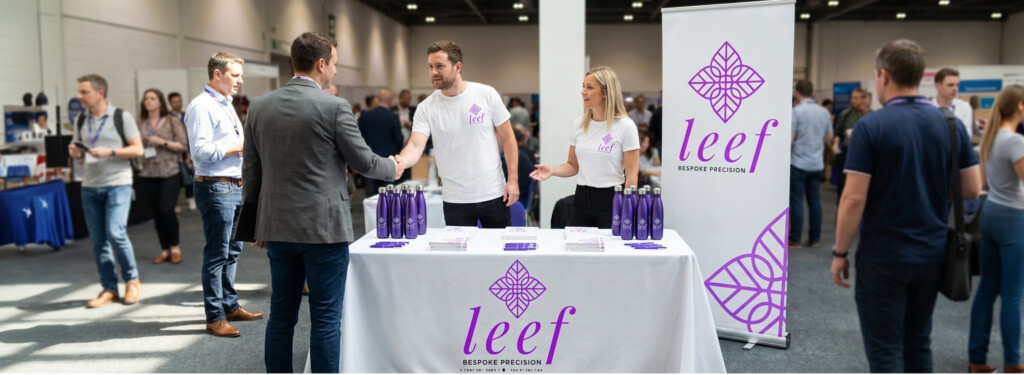 Branded exhibition stand with promotional merchandise
