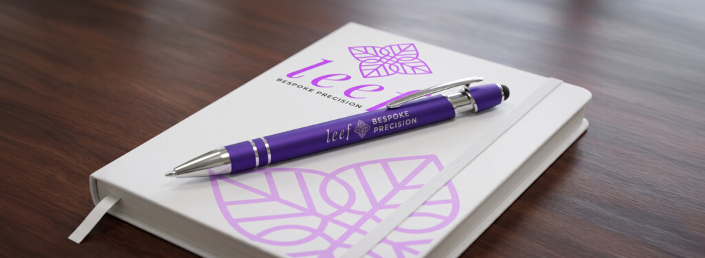 positioning Branded premium metal pen and notebook